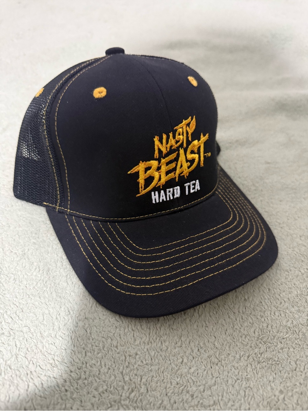 Nasty Beast Hard Tea Black & Gold Trucker Hat